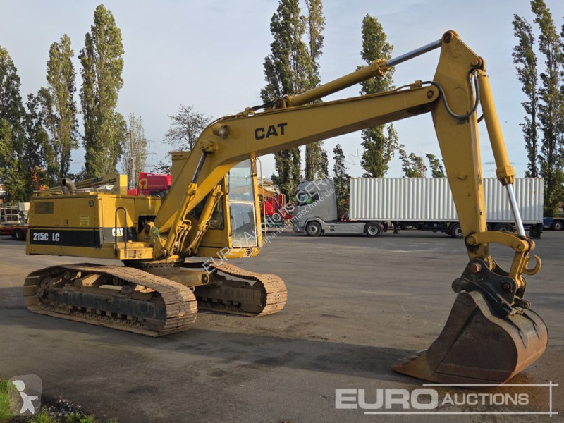 Багер Caterpillar 215C