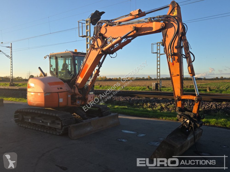 Багер Komatsu