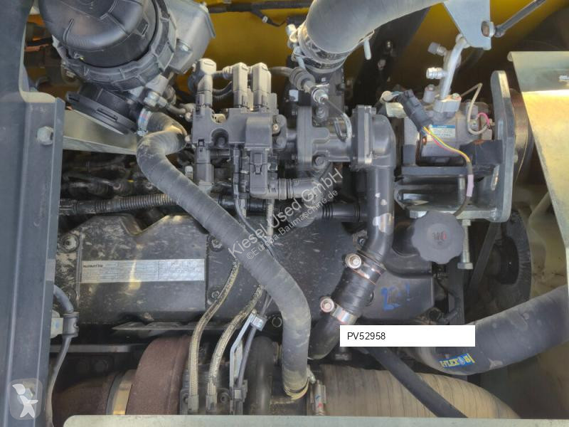 Escavadora Komatsu 11
