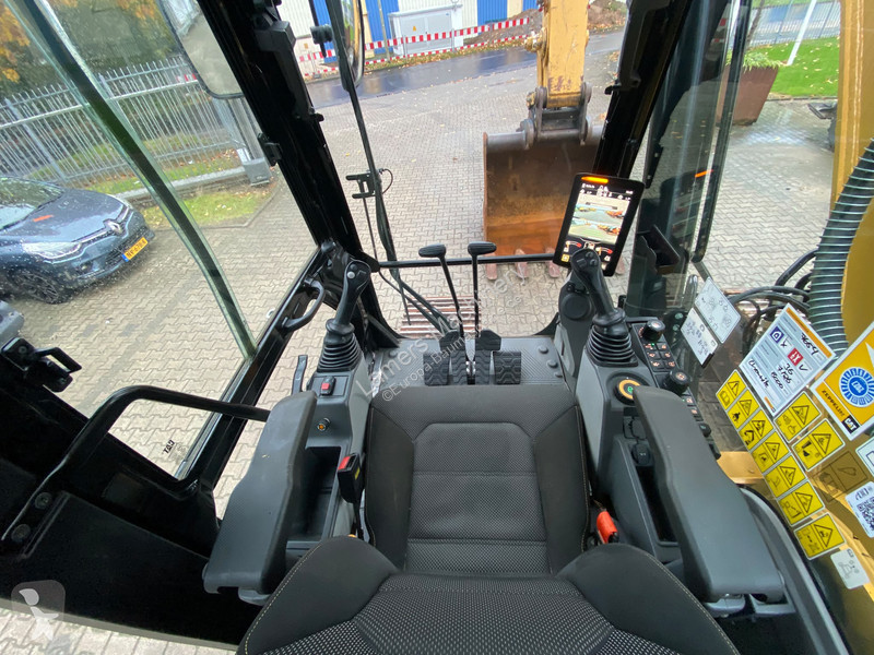 Graafmachine Caterpillar NG .