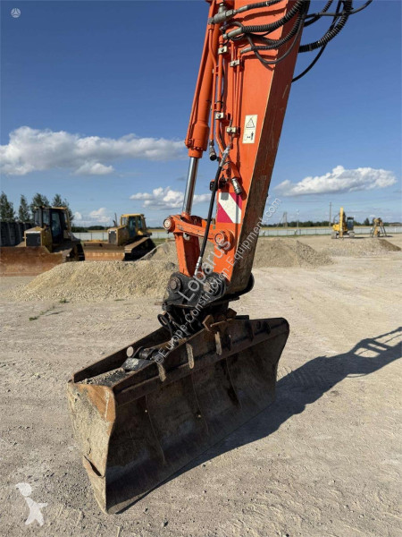 Escavadora Hitachi 140 W