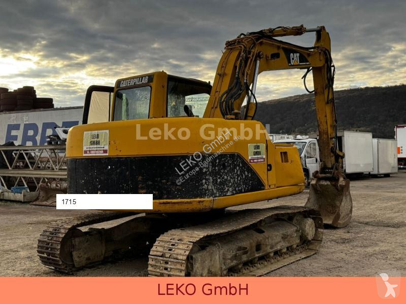 Lopatový nakládač Caterpillar 311C Mit Zwei...