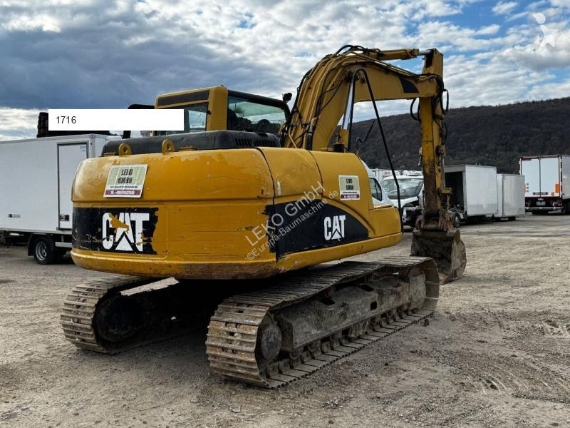 Escavatore Caterpillar C Mit Zwei Löffeln