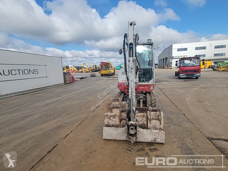 Escavadora Takeuchi 0