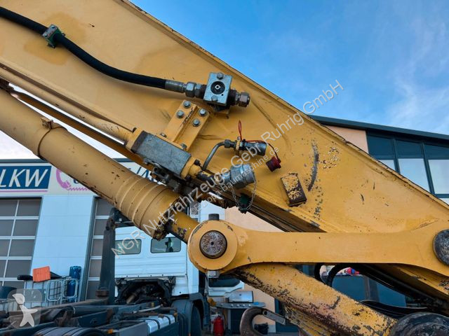 Rýpadlo Komatsu 23200 Kg 107 Kw