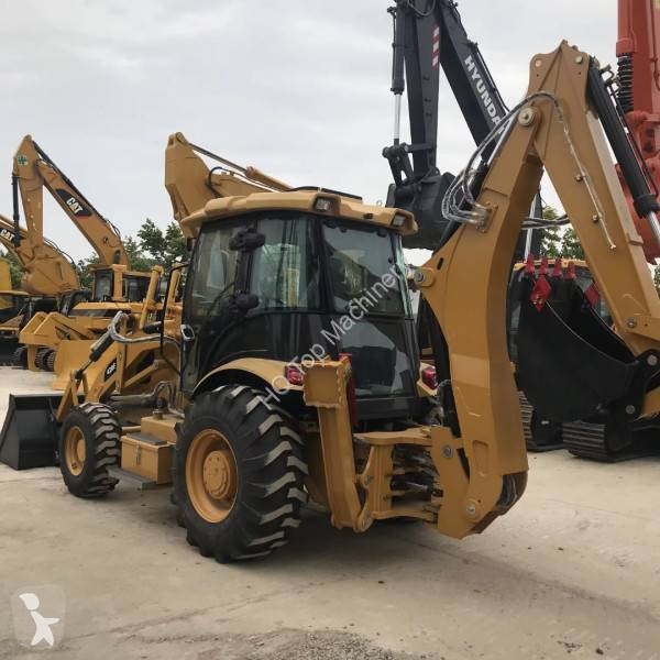 Traktor med grab Caterpillar CAT420F CAT430F...