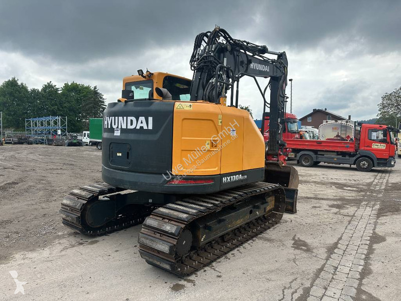 جرافة Hyundai HX 130 ALCR Kettenbagger 76.000...