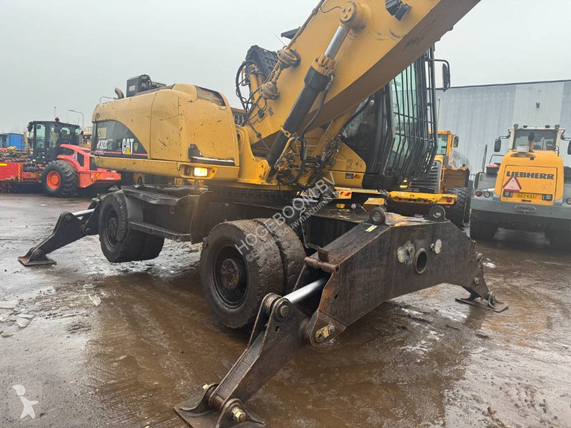 Rýpadlo Caterpillar M 322 C MH