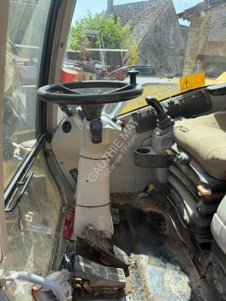 Lopatový nakládač New Holland 26
