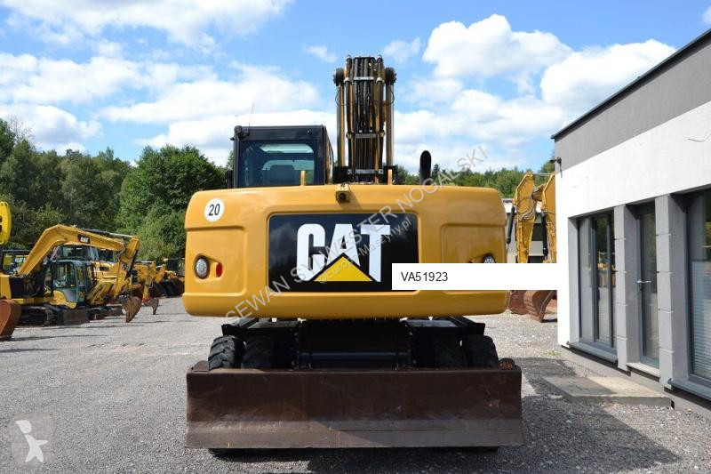 Lopatový nakládač Caterpillar 318 D