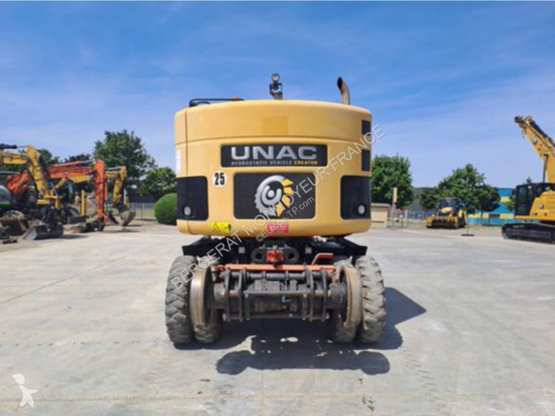 Багер Caterpillar M315D