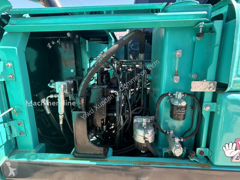 Багер Kobelco SK75