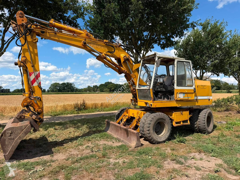 Екскаватор Liebherr