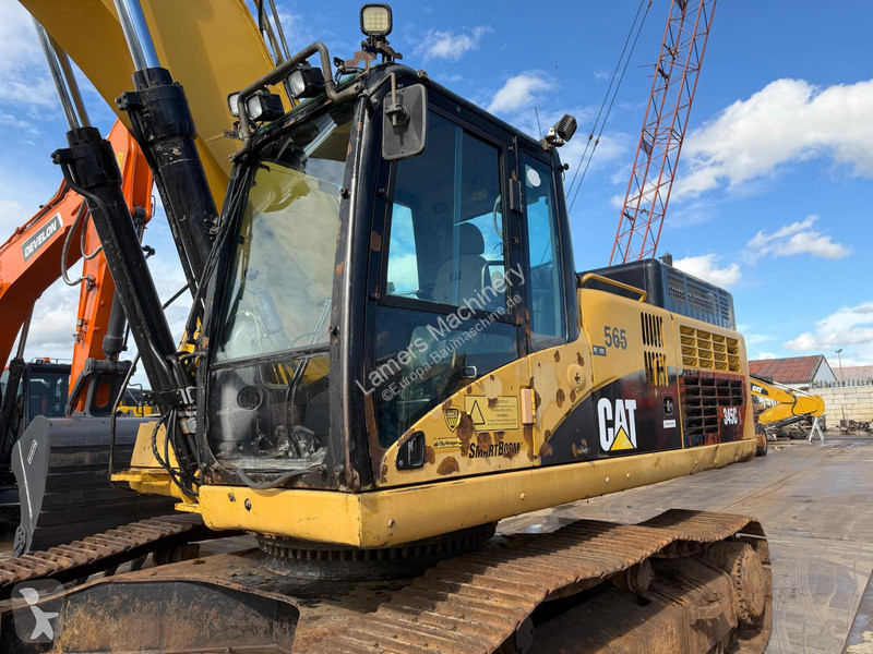 Екскаватор Caterpillar