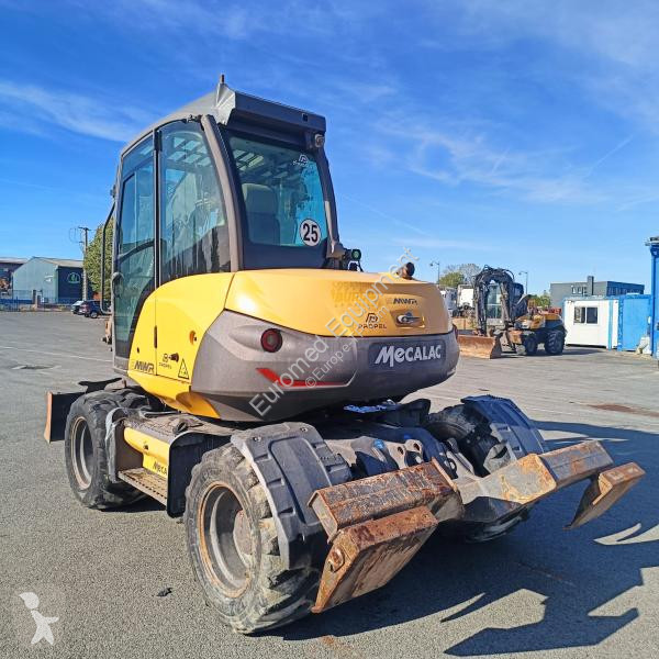 Pelle Mecalac  9MWR