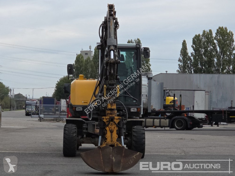 Багер Volvo EW60E