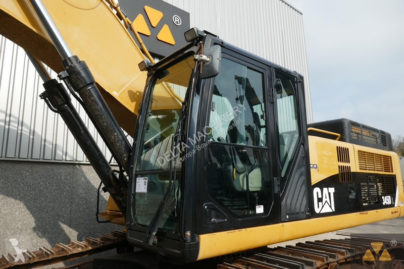 Багер Caterpillar LME