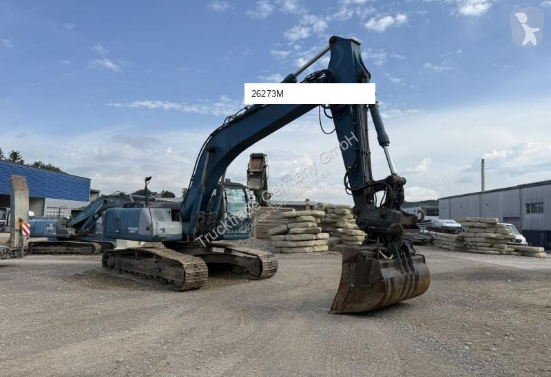 Багер New Holland Bagger / Swiss-Vehicle