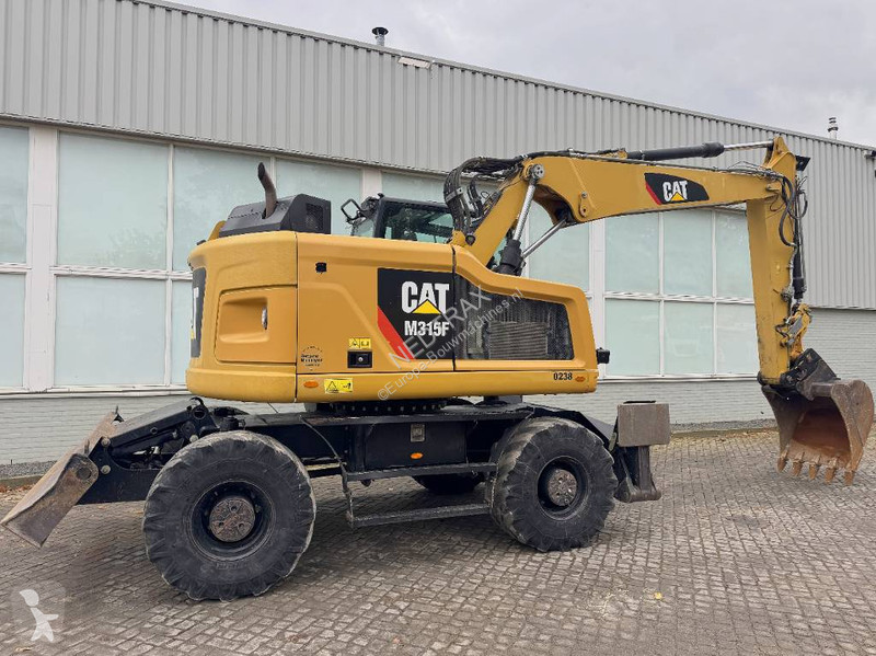 Багер Caterpillar F 2017