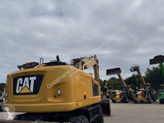 Багер Caterpillar F