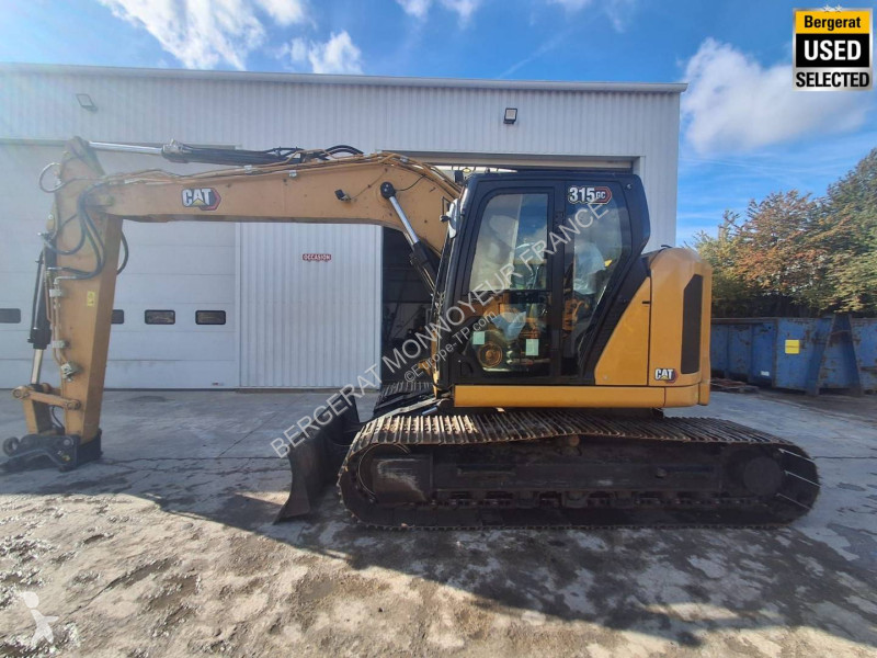 Graafmachine Caterpillar GC