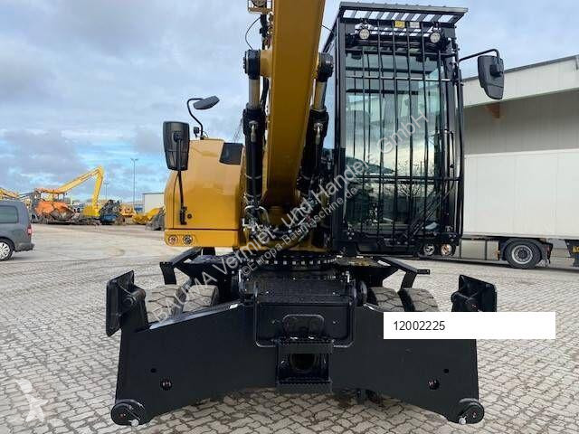 Graafmachine Caterpillar MH 3022 MIETE / RENTAL...
