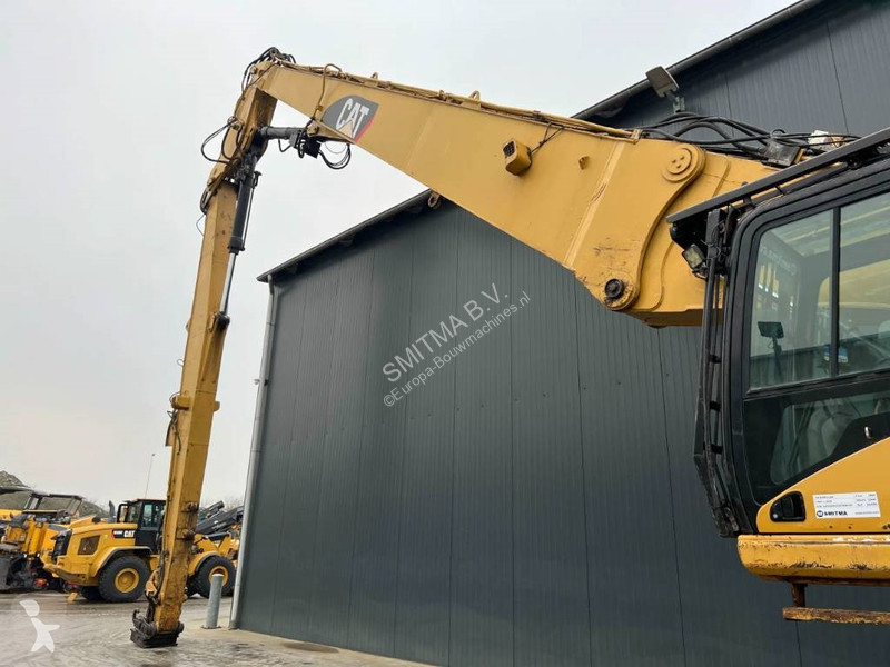 جرافة Caterpillar L UHD - 27m - OilQuick