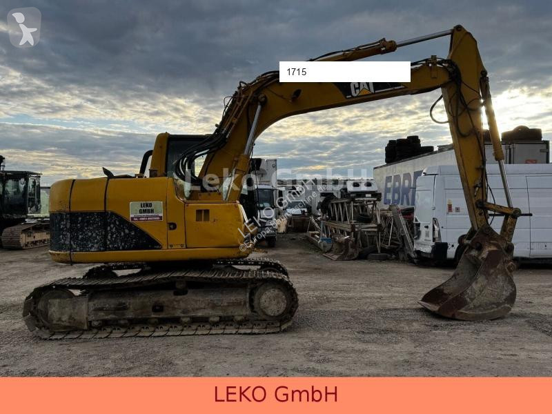 Lopatový nakládač Caterpillar 311C Mit Zwei...
