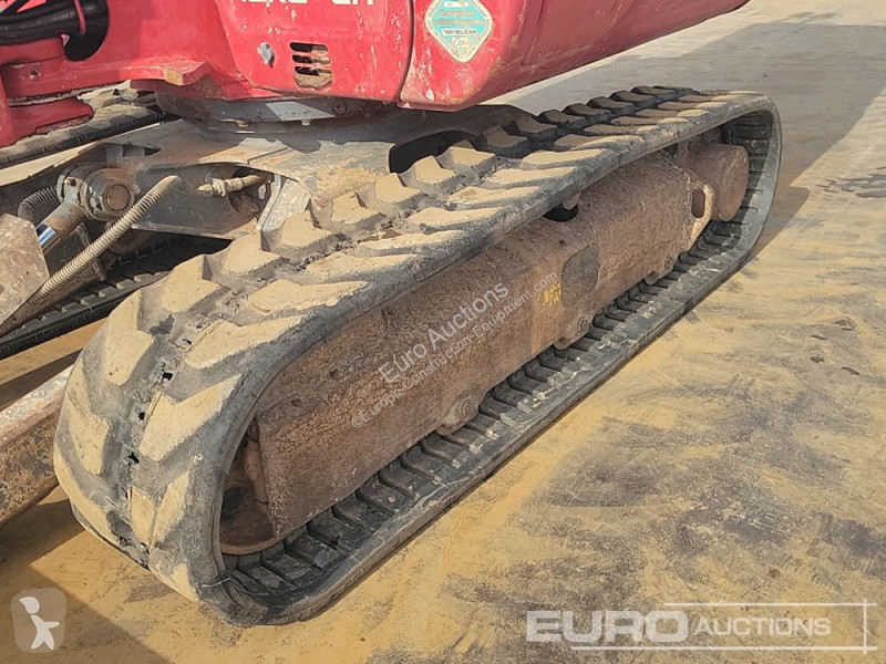 Escavadora Takeuchi 0