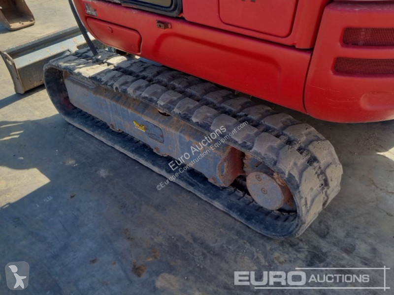 Escavadora Takeuchi 0