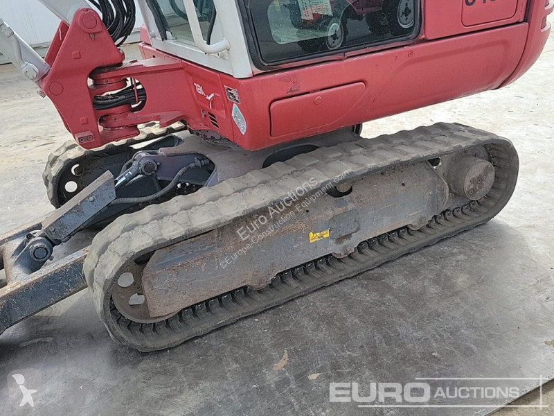 Escavadora Takeuchi 0
