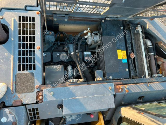 Rýpadlo Komatsu 23200 Kg 107 Kw