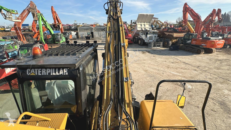 Rýpadlo Caterpillar M 4X4