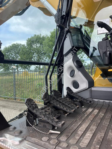 Rýpadlo Caterpillar 325 with dozerblade 1085...