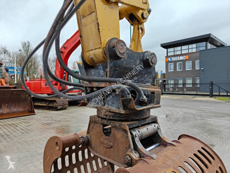 Escavatore Caterpillar M 318 D MH + GRAB