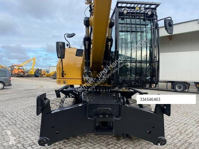 جرافة Caterpillar MH 3022 MIETE / RENTAL...