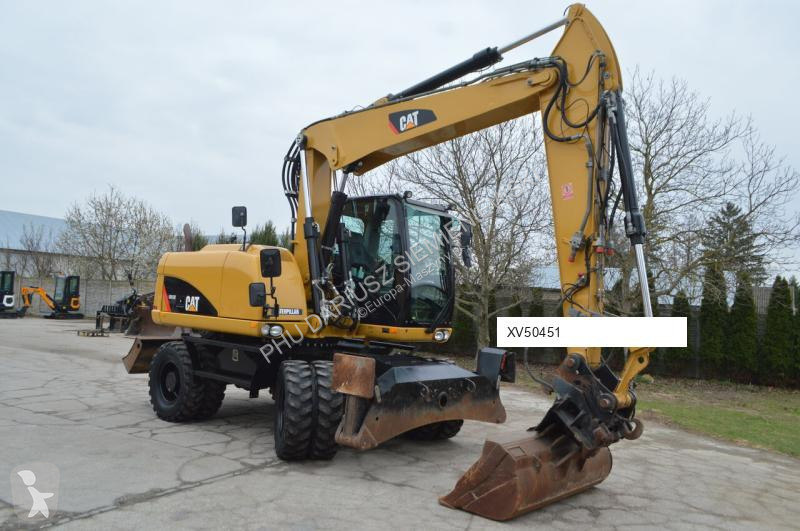 Lopatový nakládač Caterpillar 313