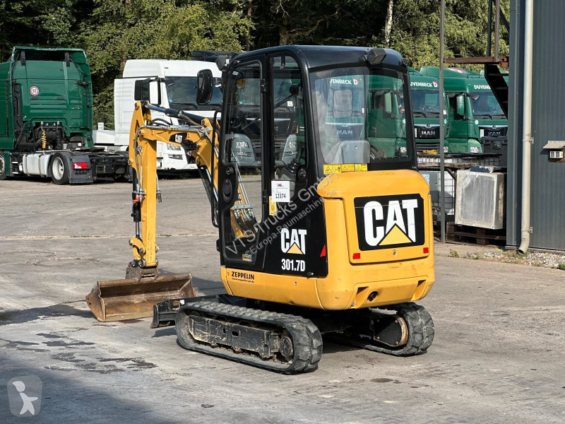 جرافة Caterpillar Gummikette / 2 Löffel /...