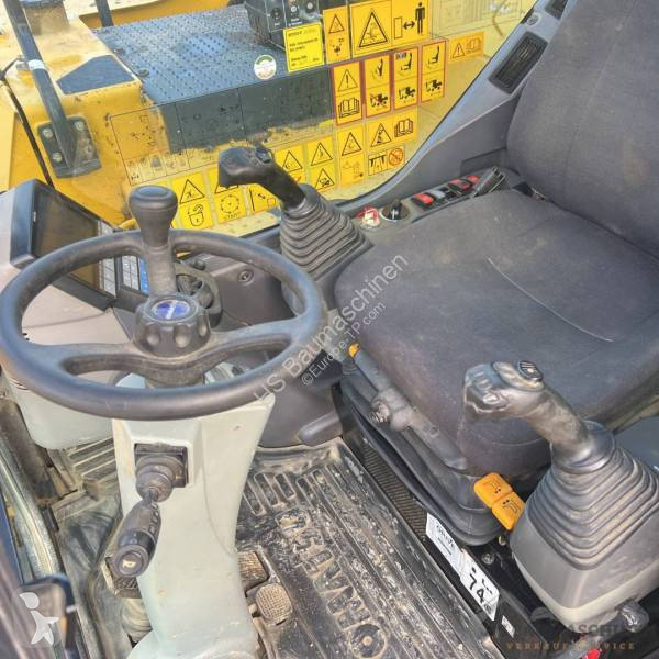 Pelle Komatsu PW118MR-11