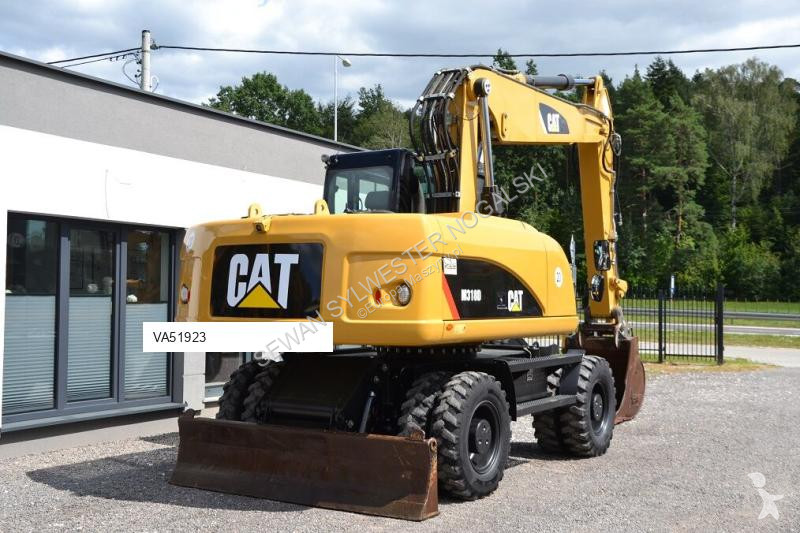 Lopatový nakládač Caterpillar 318 D