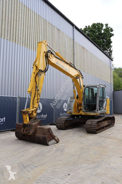 Багер New Holland Kobelco 2