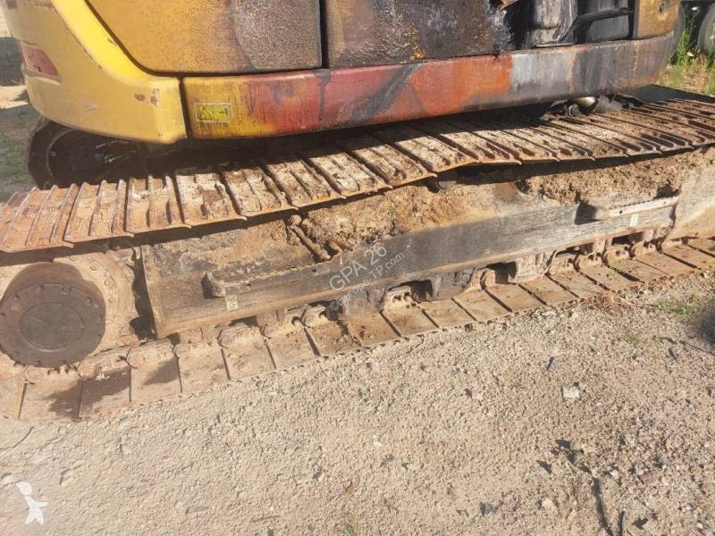 Екскаватор Caterpillar