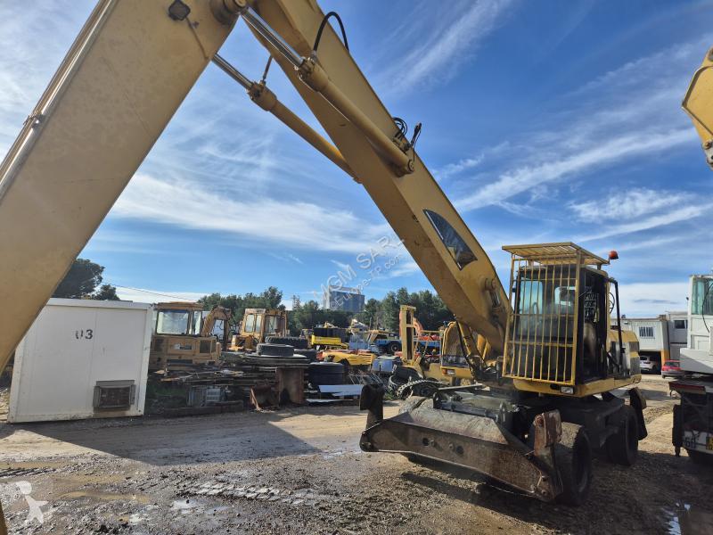 جرافة Caterpillar M Mono