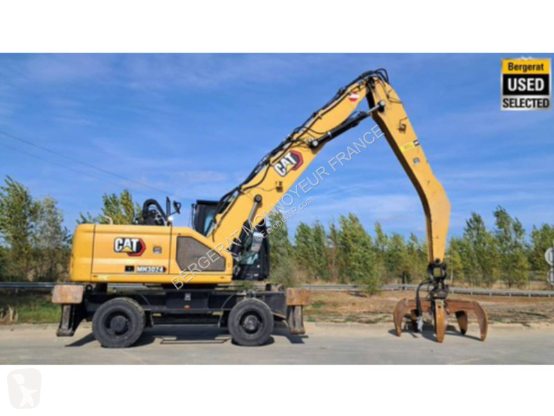 Pelle Caterpillar MH3024