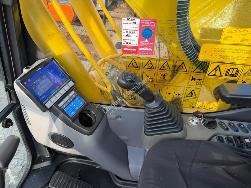 Багер Komatsu PC 210-11 .
