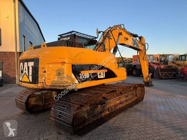 Багер Caterpillar L
