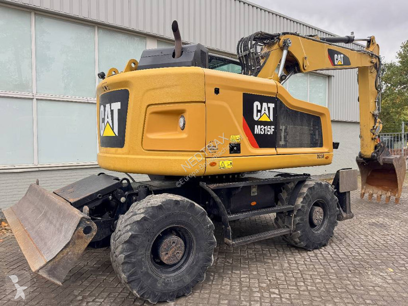 Багер Caterpillar F 2017
