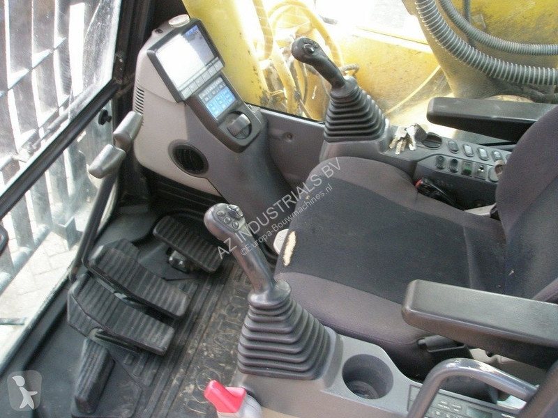 Escavadora Komatsu 240LC-10