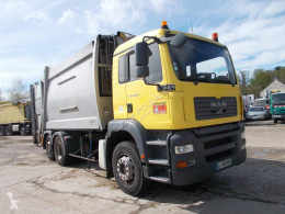 Maquinaria vial MAN TGA 26.320 camión volquete para residuos domésticos usado