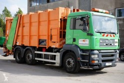 Maquinaria vial MAN TGA 26.310 camión volquete para residuos domésticos usado